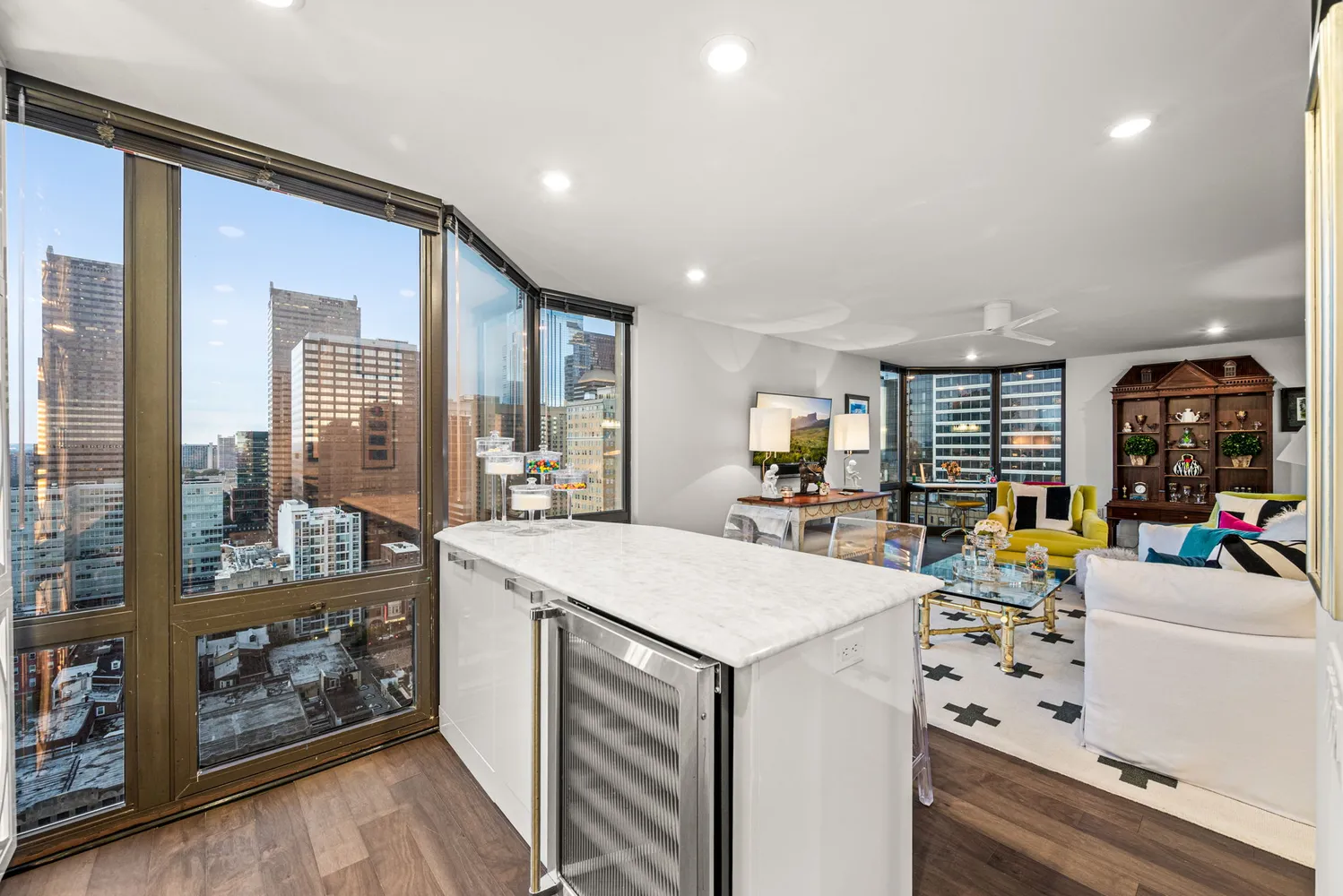 a view of kitchen with sink and natural light
