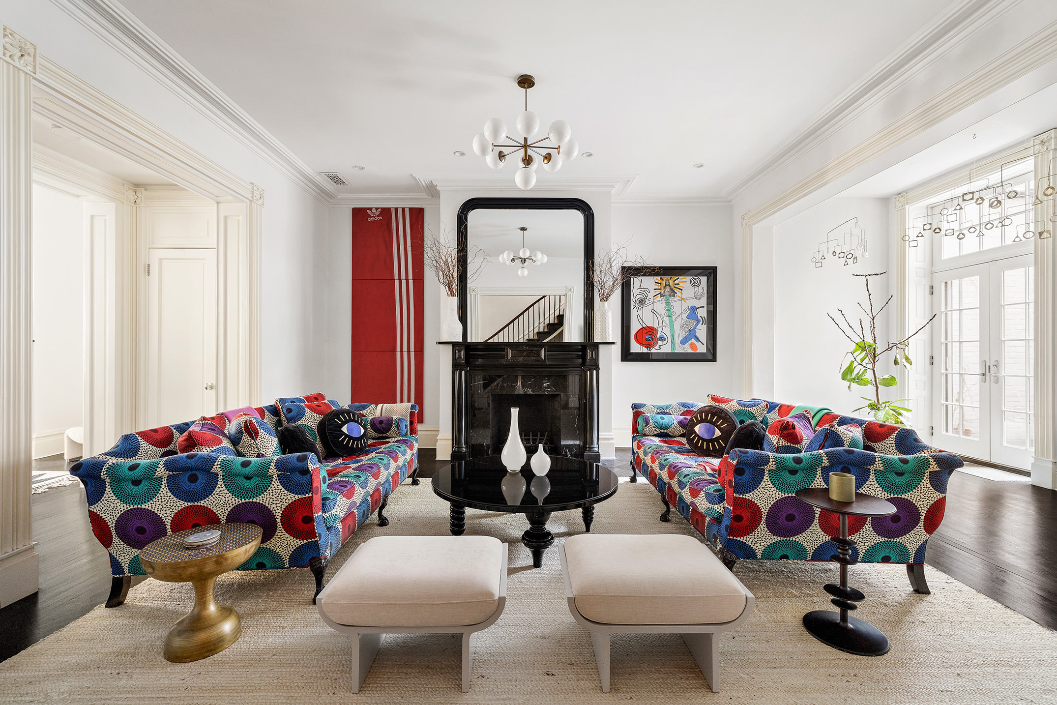 104 Willow Street Brooklyn, NY 11201 - Photo 3 of 27 a living room with furniture flowers and a chandelier