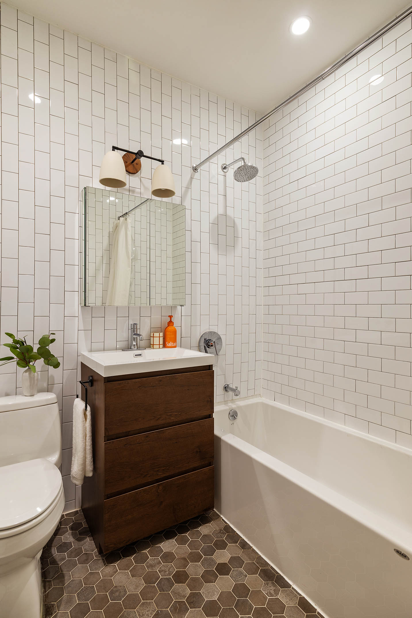1025 Lorimer Street, Unit PARLOR Brooklyn, NY 11222 - Photo 14 of 21 a bathroom with a bathtub shower sink and toilet