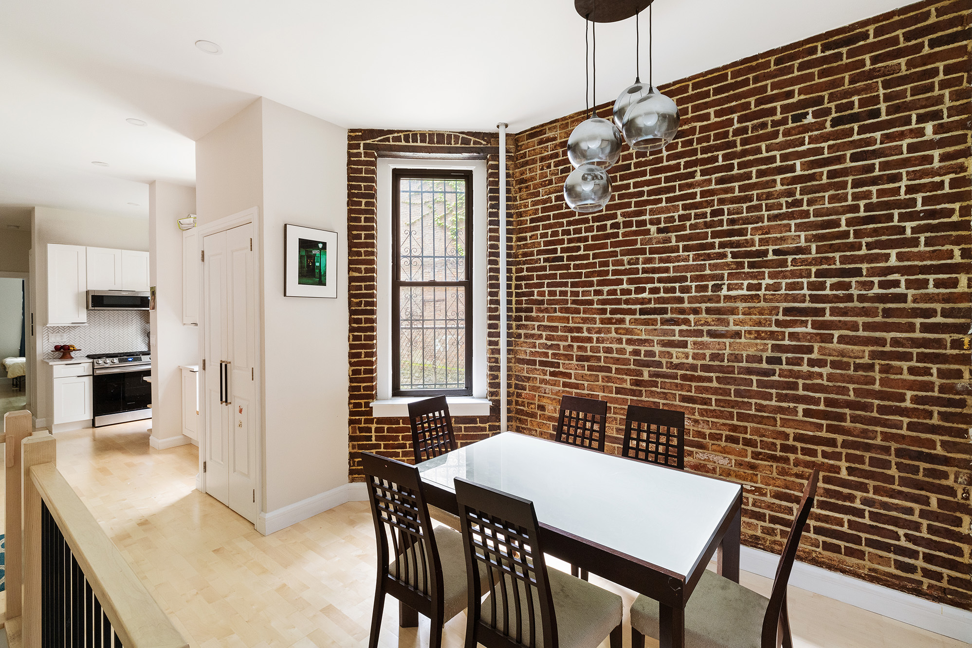 330 East 94th Street, Unit 1AB Manhattan, NY 10128 - Photo 4 of 14 a view of a dining room with furniture