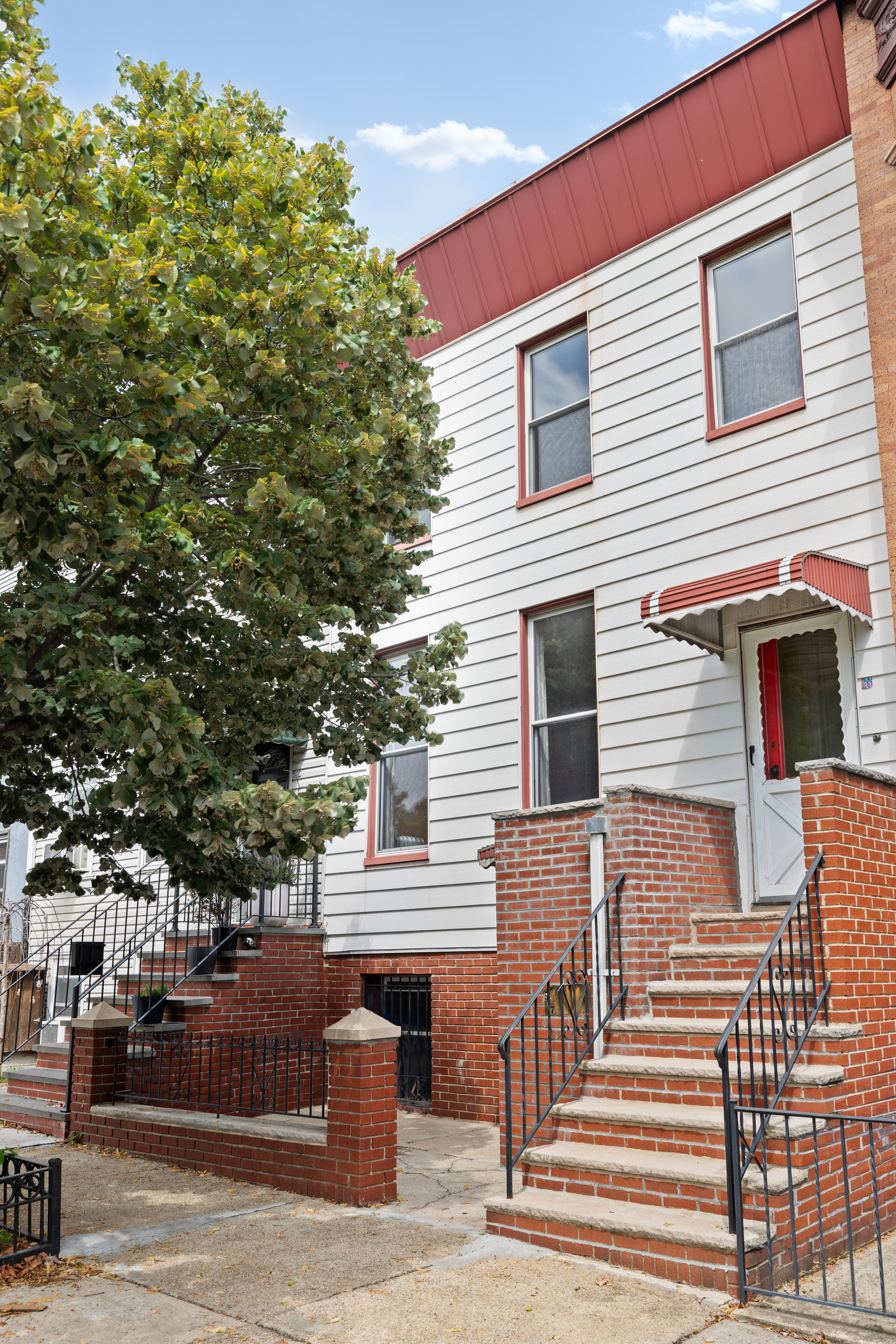 537 18th Street Brooklyn, NY 11215 - Photo 9 of 12 a view of a house with a tree