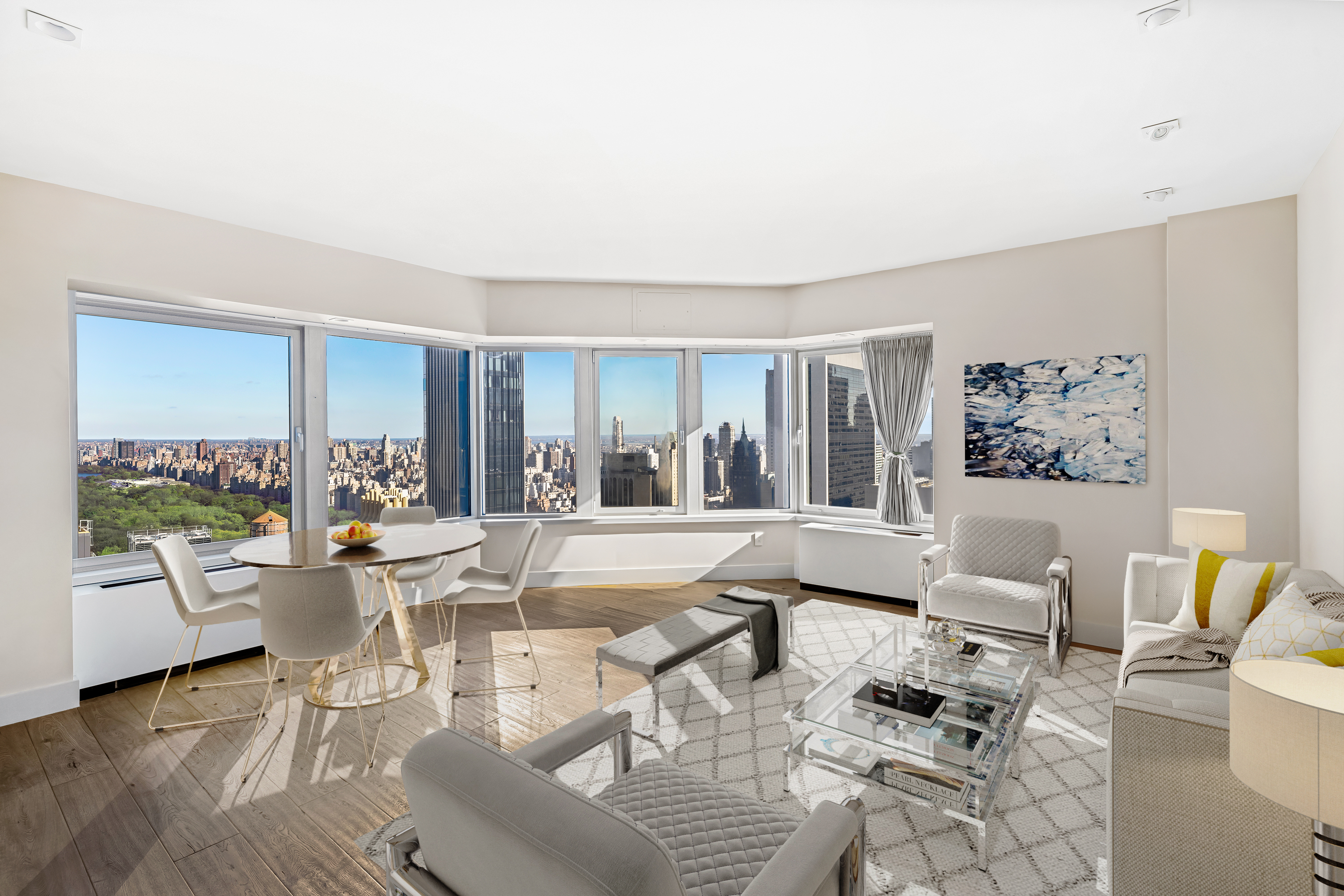 150 West 56th Street, Unit 4802 Manhattan, NY 10019 - Photo 1 of 13 a living room with furniture and a large window