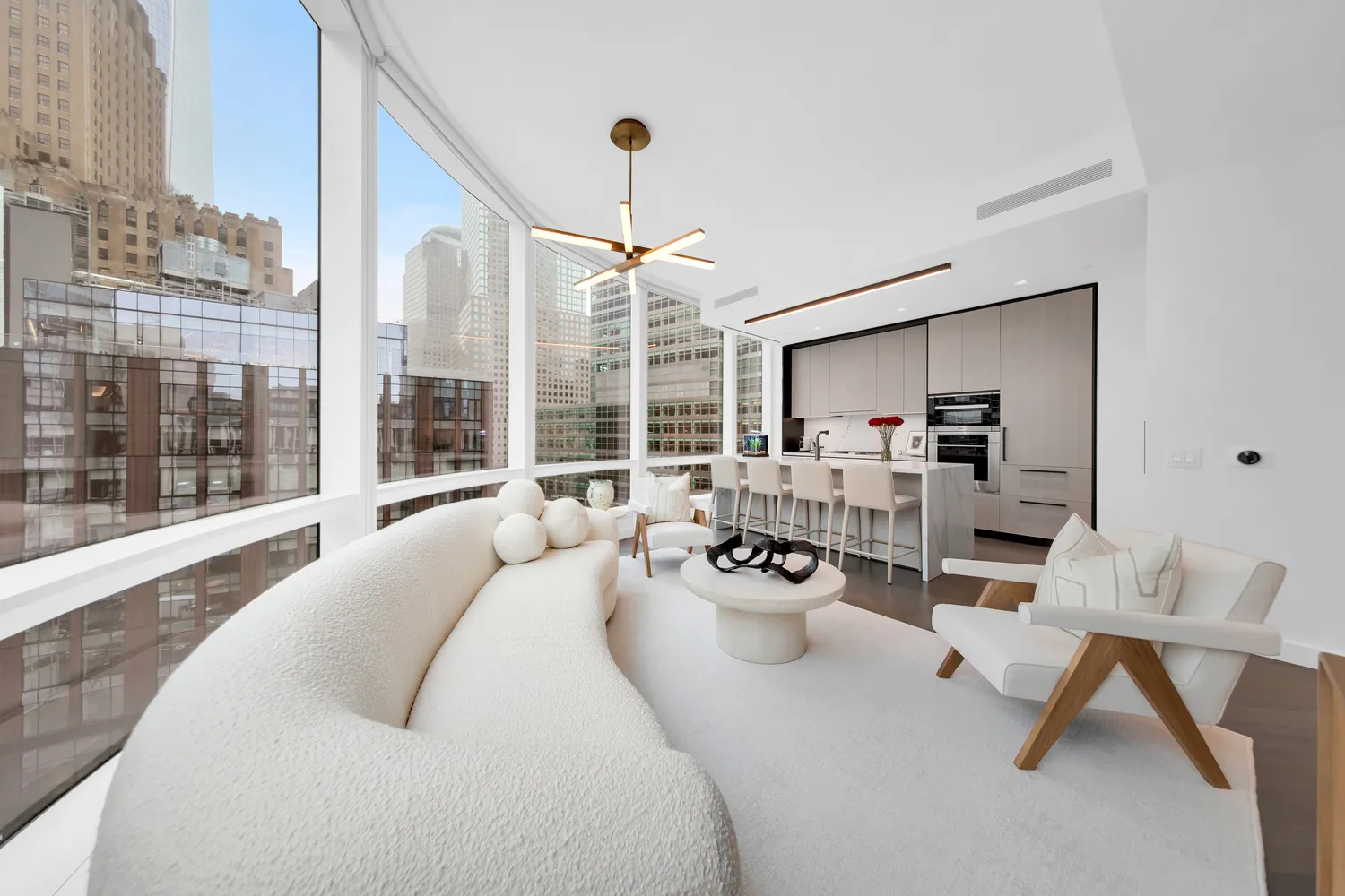 a bed room with furniture and a chandelier