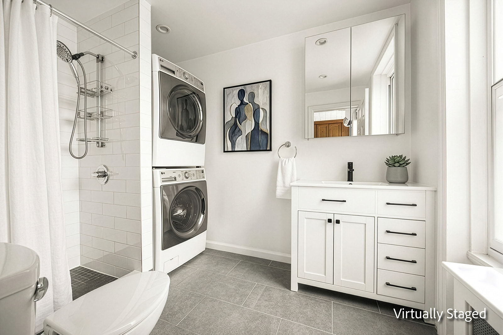 616 Carroll Street, Unit 2 Brooklyn, NY 11215 - Photo 6 of 15 a bathroom with a sink a washer and dryer