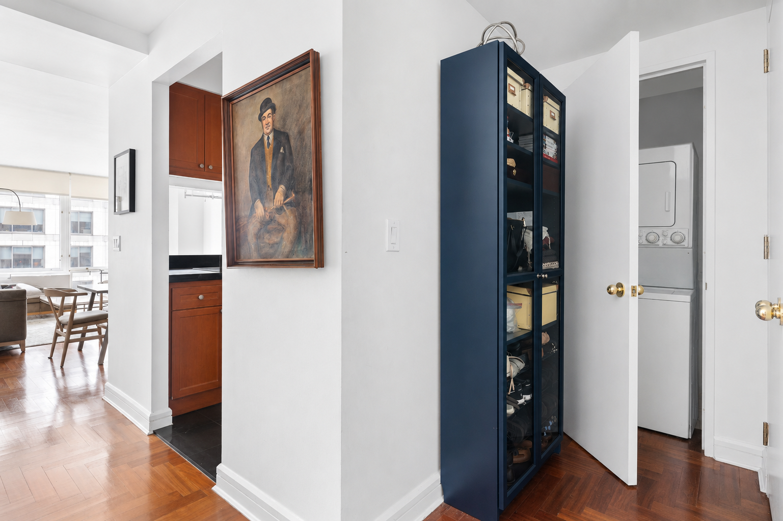 220 Riverside Boulevard, Unit 7G Manhattan, NY 10069 - Photo 3 of 11 a view of a hallway with wooden floor and dining room