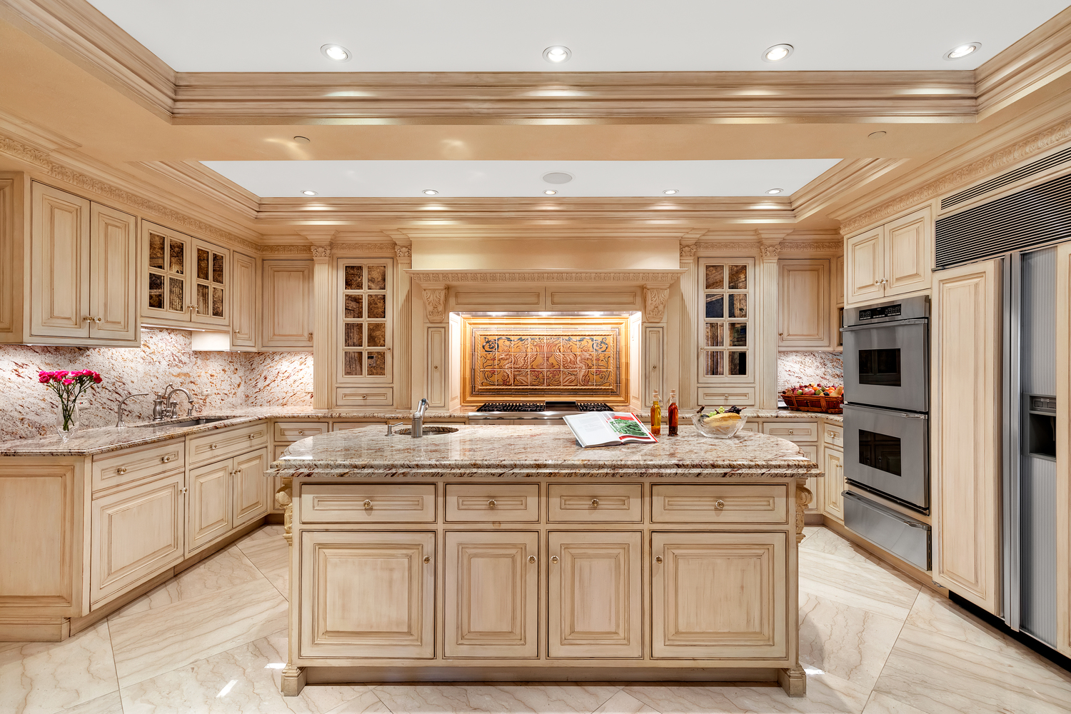 838 5th Avenue, Unit 6 Manhattan, NY 10065 - Photo 7 of 23 a kitchen with granite countertop a sink and cabinets