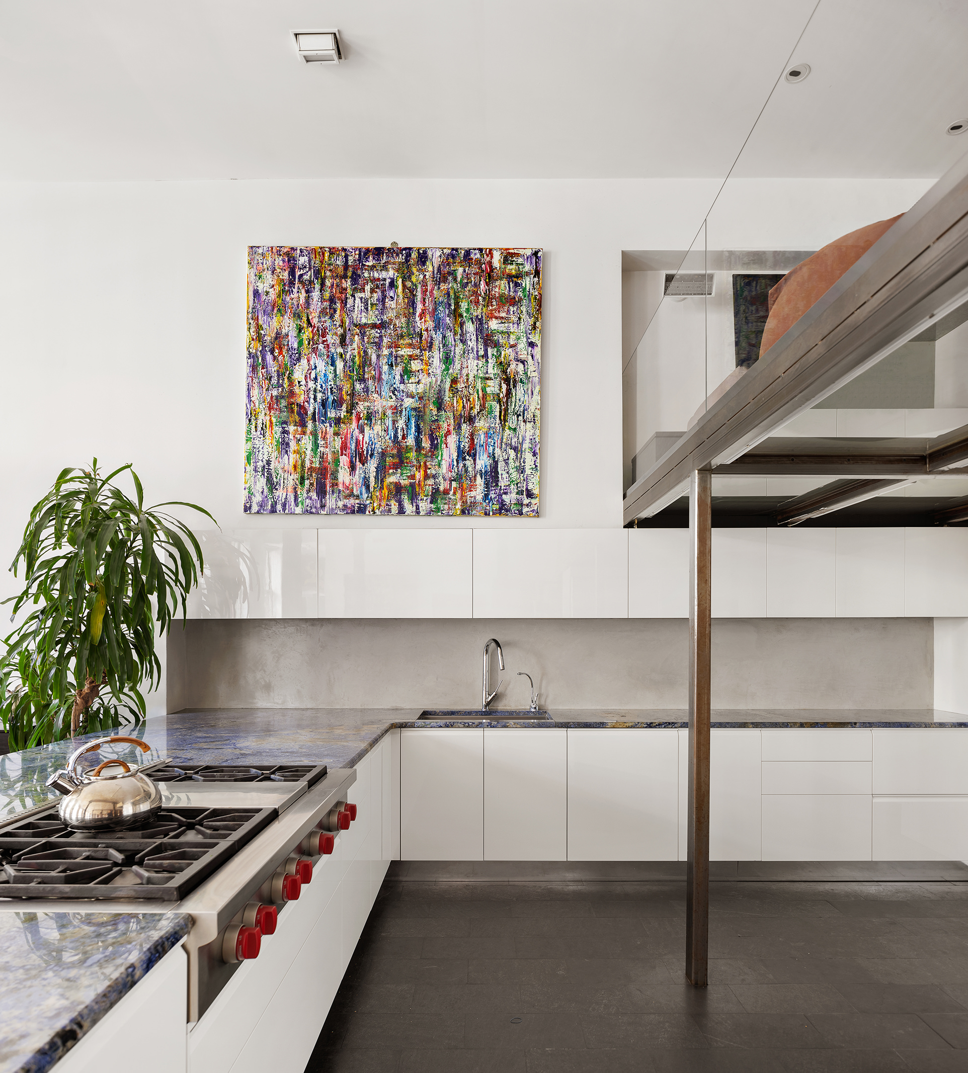 84 Mercer Street, Unit 3E Manhattan, NY 10012 - Photo 8 of 19 a kitchen with a sink and a stove top oven