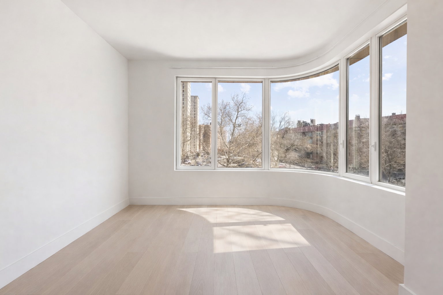 208 Delancey Street, Unit 3A Manhattan, NY 10002 - Photo 2 of 7 a view of an empty room with a window