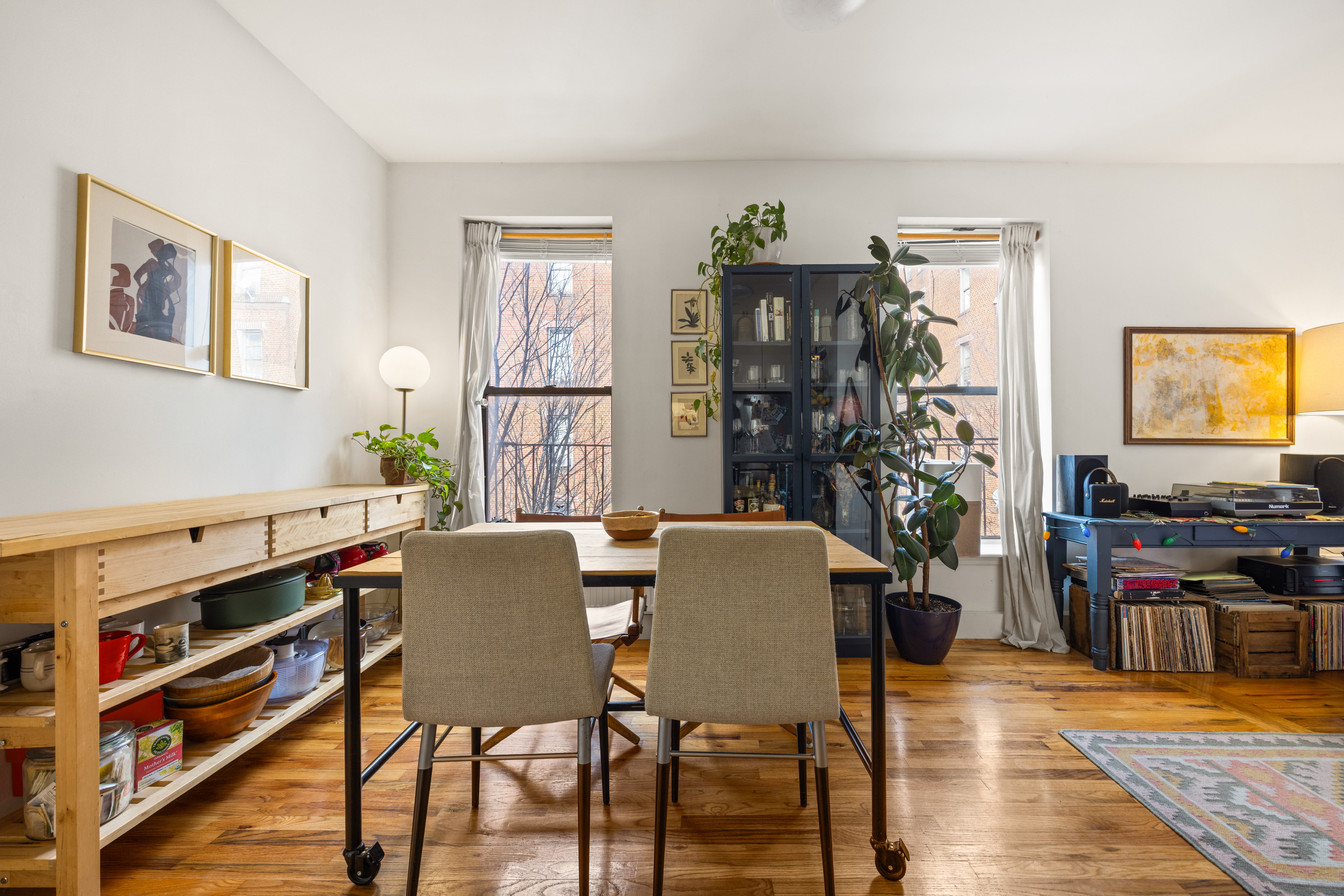 44 Turner Place, Unit 2 Brooklyn, NY 11218 - Photo 2 of 9 a view of a dining room with furniture and wooden floor