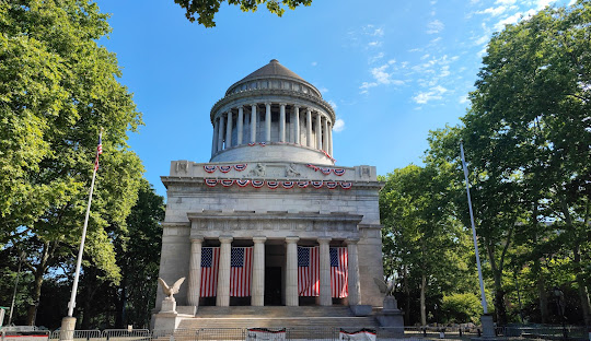 307 West 111th Street, Unit 2R Manhattan, NY 10026 - Photo 13 of 16 front view of a building with a tree