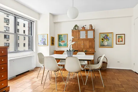 a view of a dining room with furniture