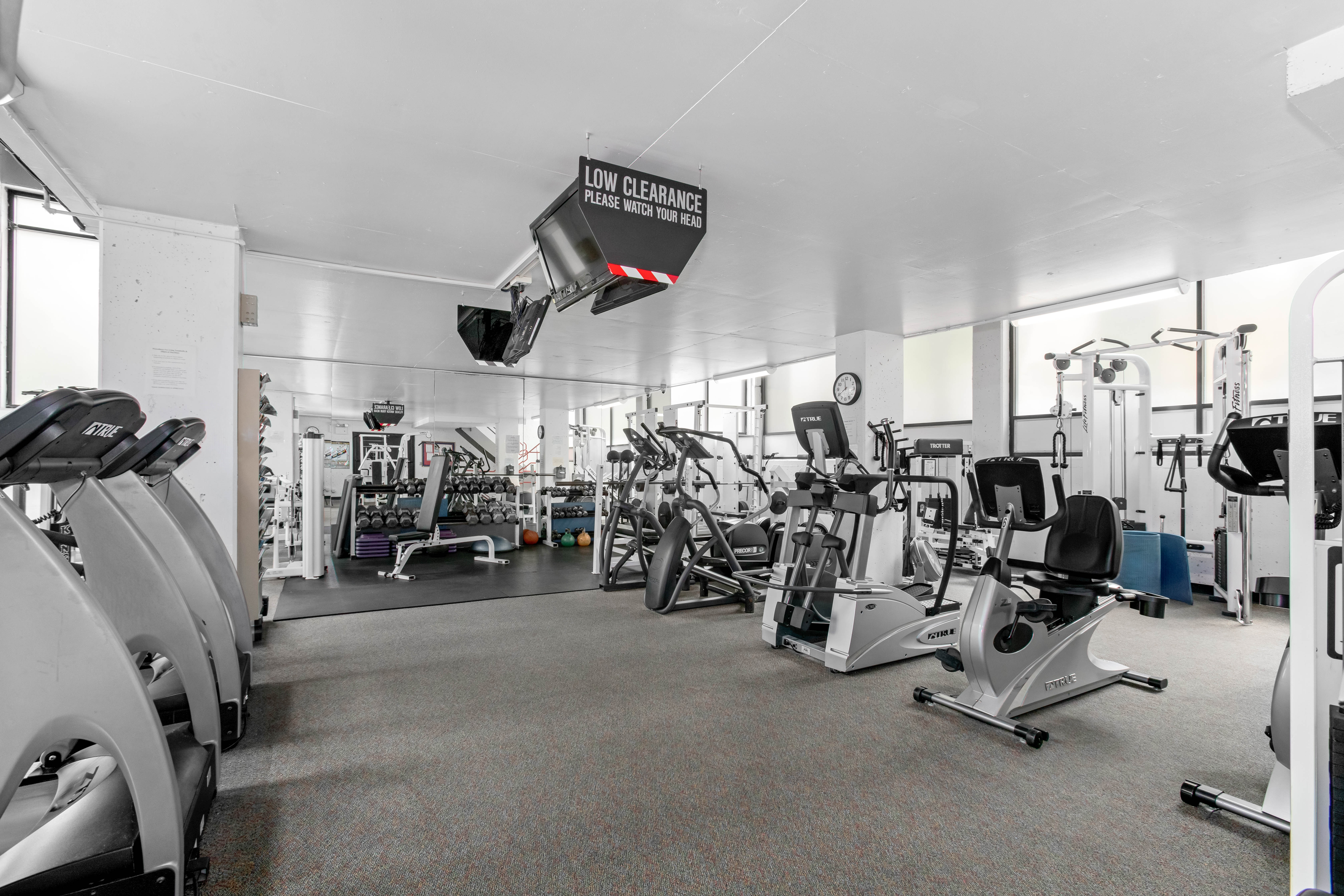 531 Main Street, Unit 509 Manhattan, NY 10044 - Photo 14 of 21 a view of a room with gym equipment