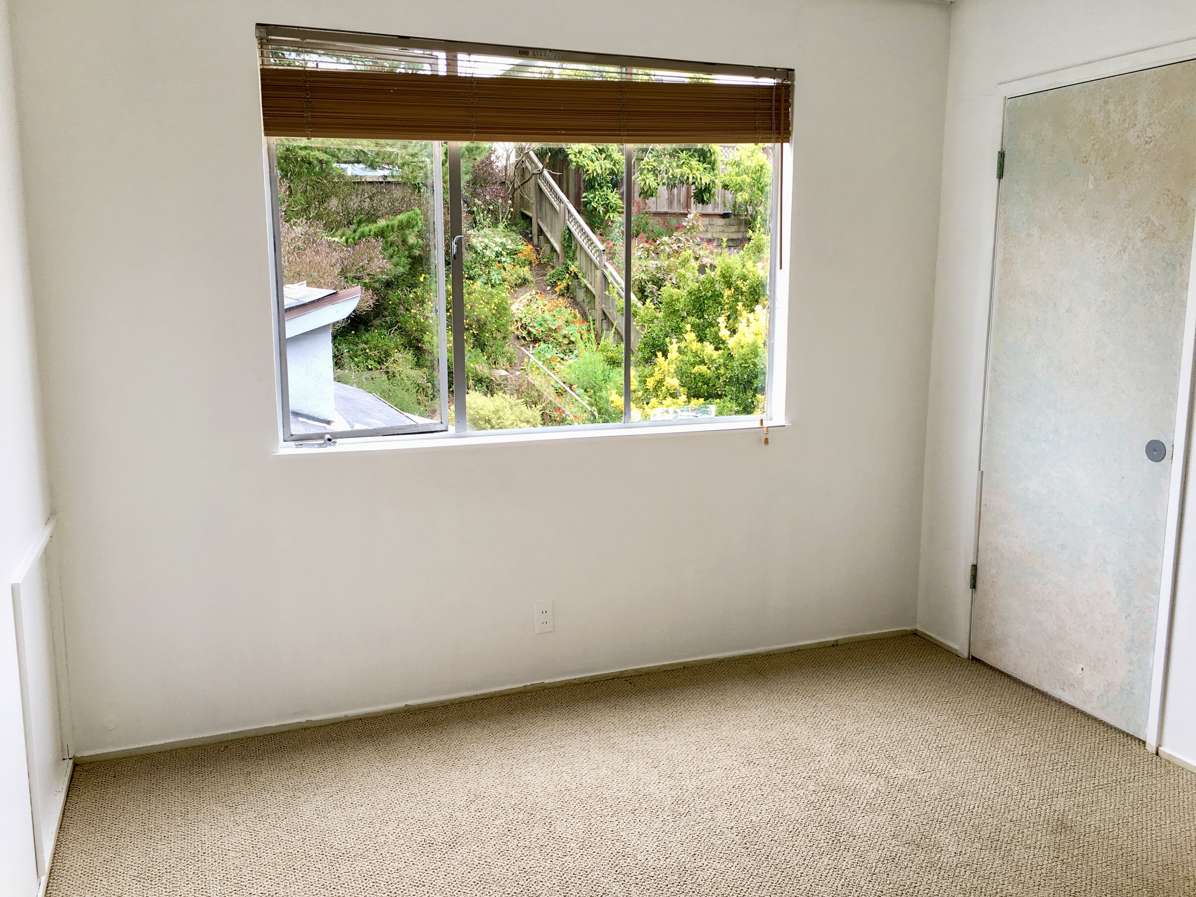 371 Inverness Drive Pacifica, CA 94044 - Photo 14 of 15 a view of a room that has a window