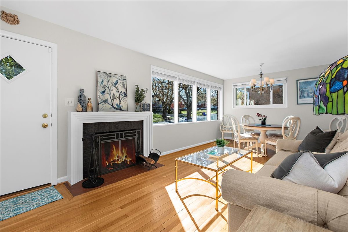 12712 Atherton Drive Silver Spring, MD 20906 - Photo 4 of 40 a living room with furniture and a fireplace