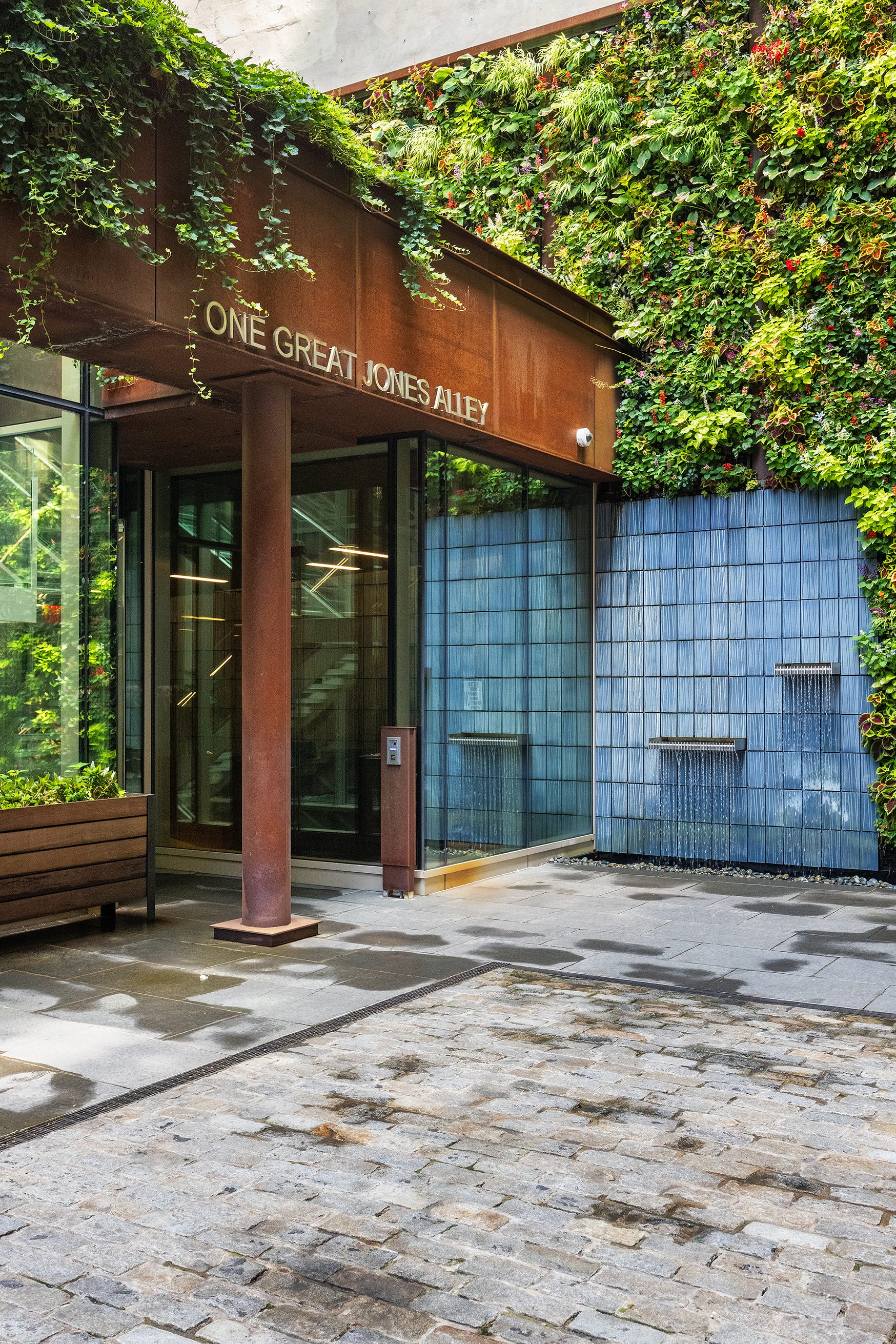 1 Great Jones Alley, Unit 10 Manhattan, NY 10012 - Photo 31 of 41 a view of a house with a tree