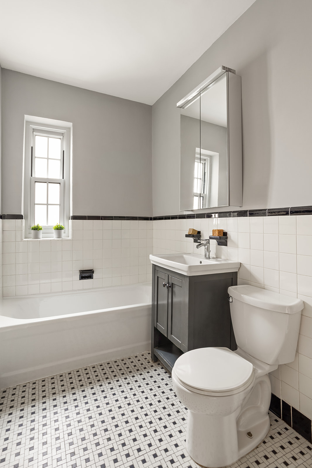 35-24 78th Street, Unit B51 Queens, NY 11372 - Photo 6 of 11 a bathroom with a sink toilet and shower