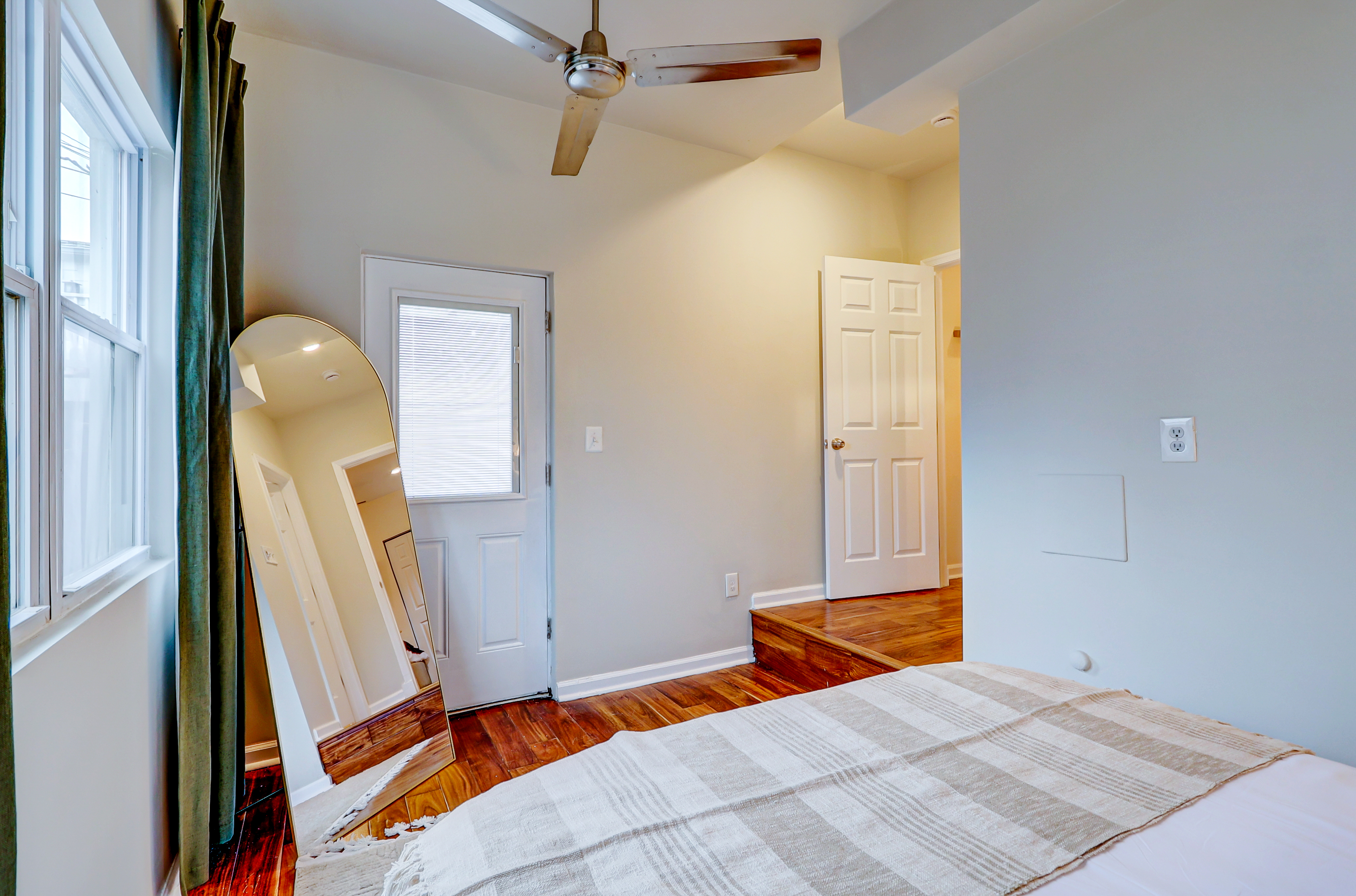 1003 P Street Northwest Washington, DC 20001 - Photo 19 of 34 a bedroom with a bed and a mirror
