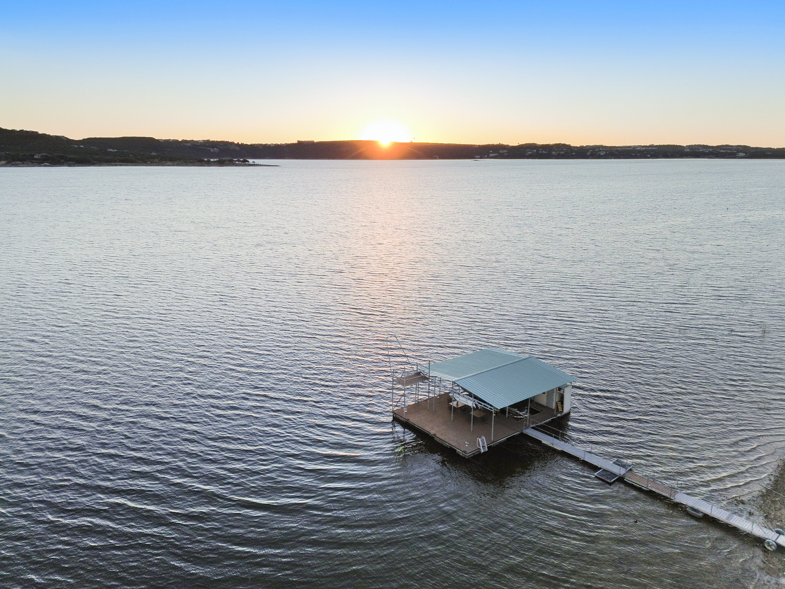 15210 Rainbow 1 Street Austin, TX 78734 - Photo 136 of 138 a view of wooden floor and lake view