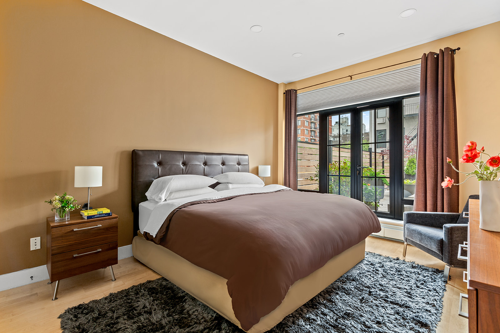 309 2nd Street, Unit 2F Brooklyn, NY 11215 - Photo 6 of 10 a bedroom with a bed and wooden floor