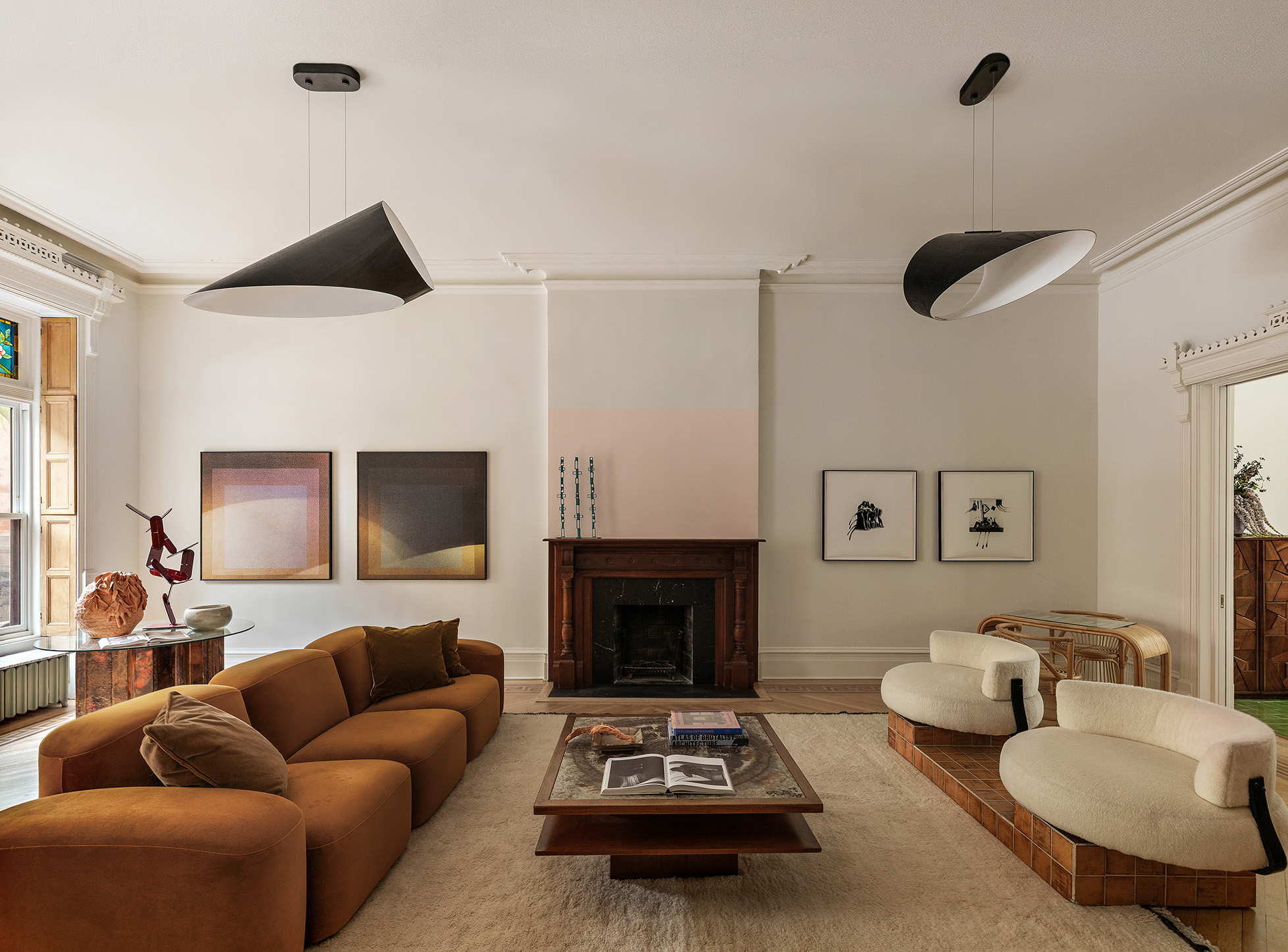 234 Clinton Street Brooklyn, NY 11201 - Photo 1 of 19 a living room with furniture and a fireplace