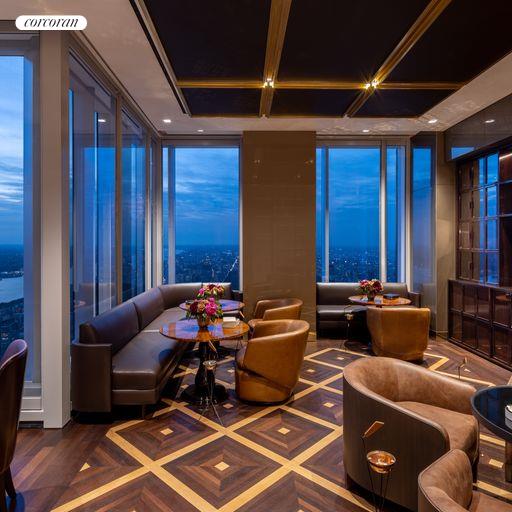 217 West 57th Street, Unit 58W Manhattan, NY 10019 - Photo 25 of 30 a room with furniture and musical instruments