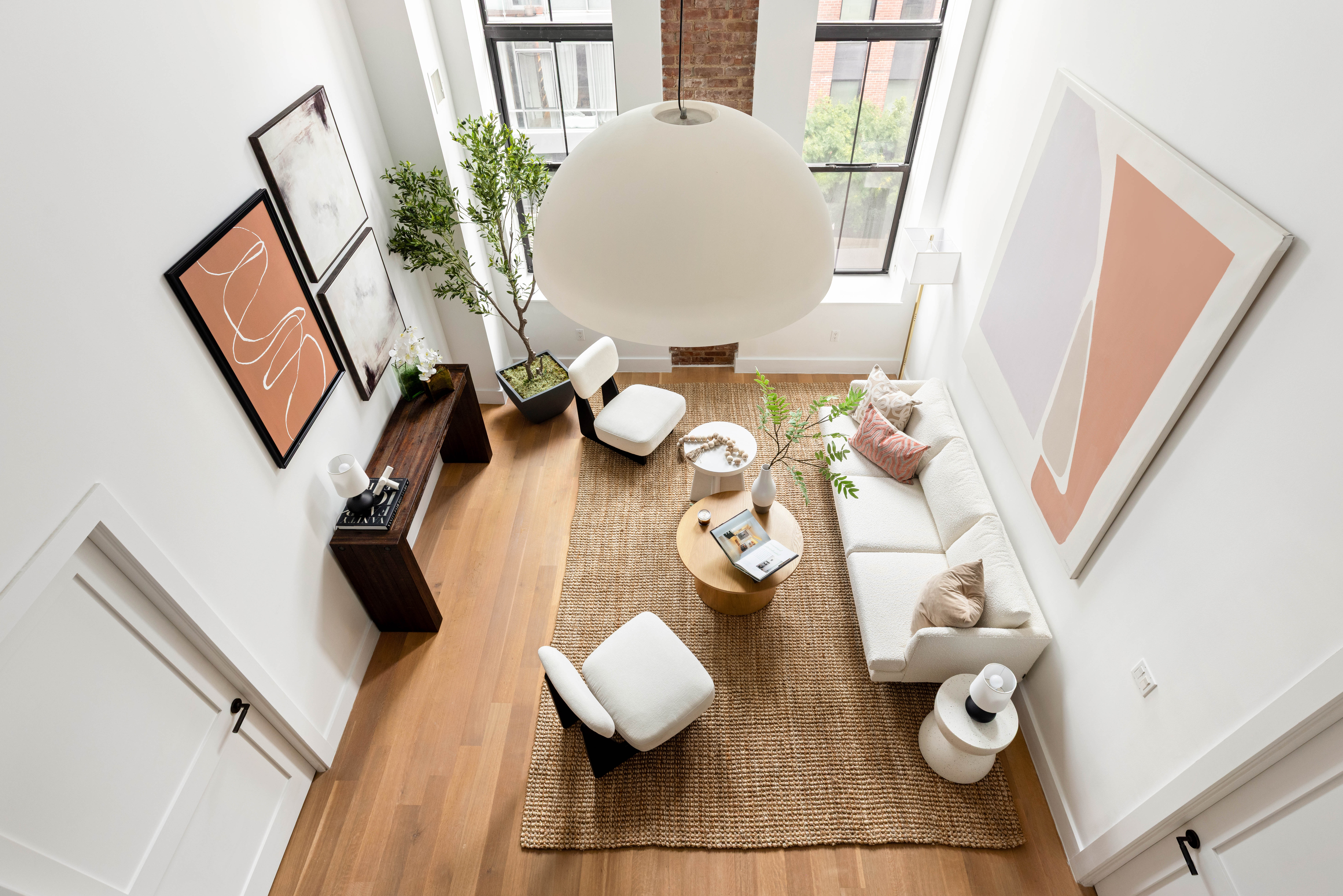 172 North 10th Street, Unit 3D Brooklyn, NY 11211 - Photo 13 of 16 a view of living room with furniture and wooden floor
