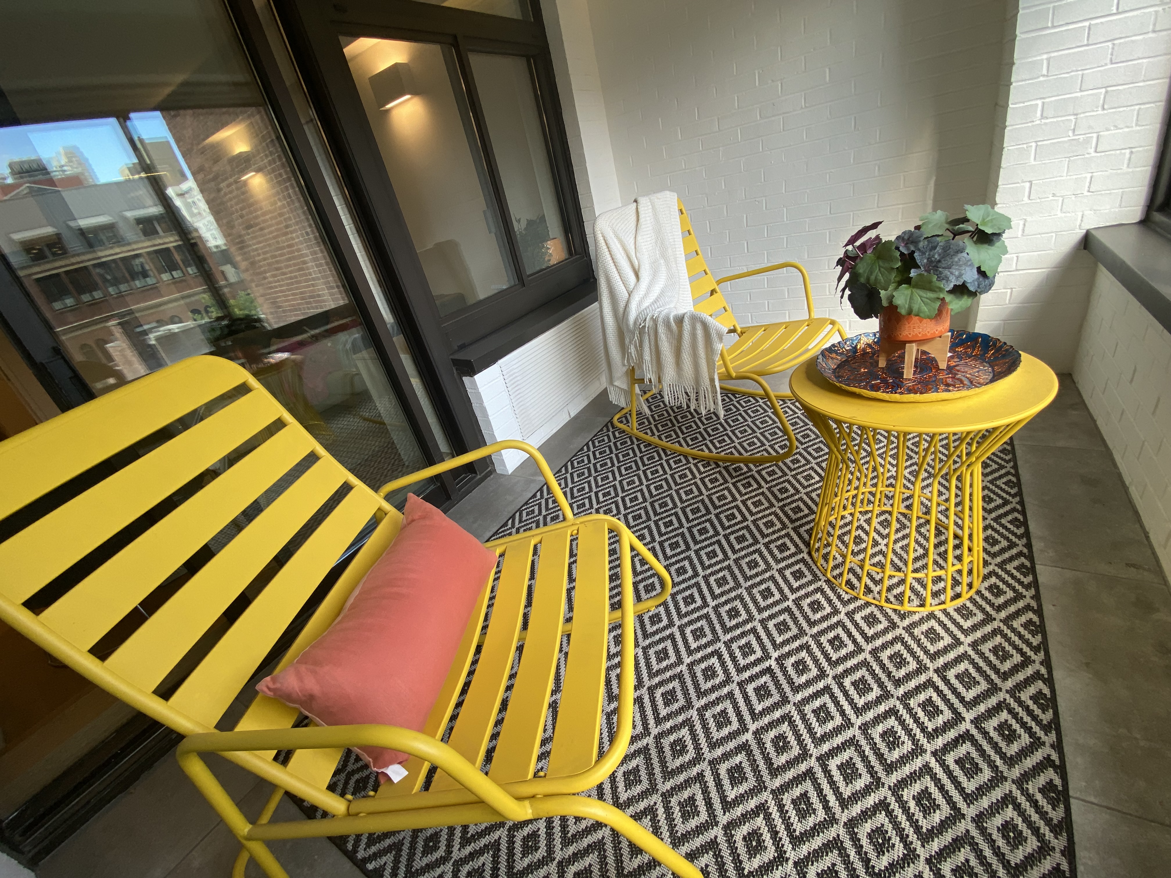 124 East 79th Street, Unit 7D Manhattan, NY 10075 - Photo 10 of 26 a swimming pool with chairs