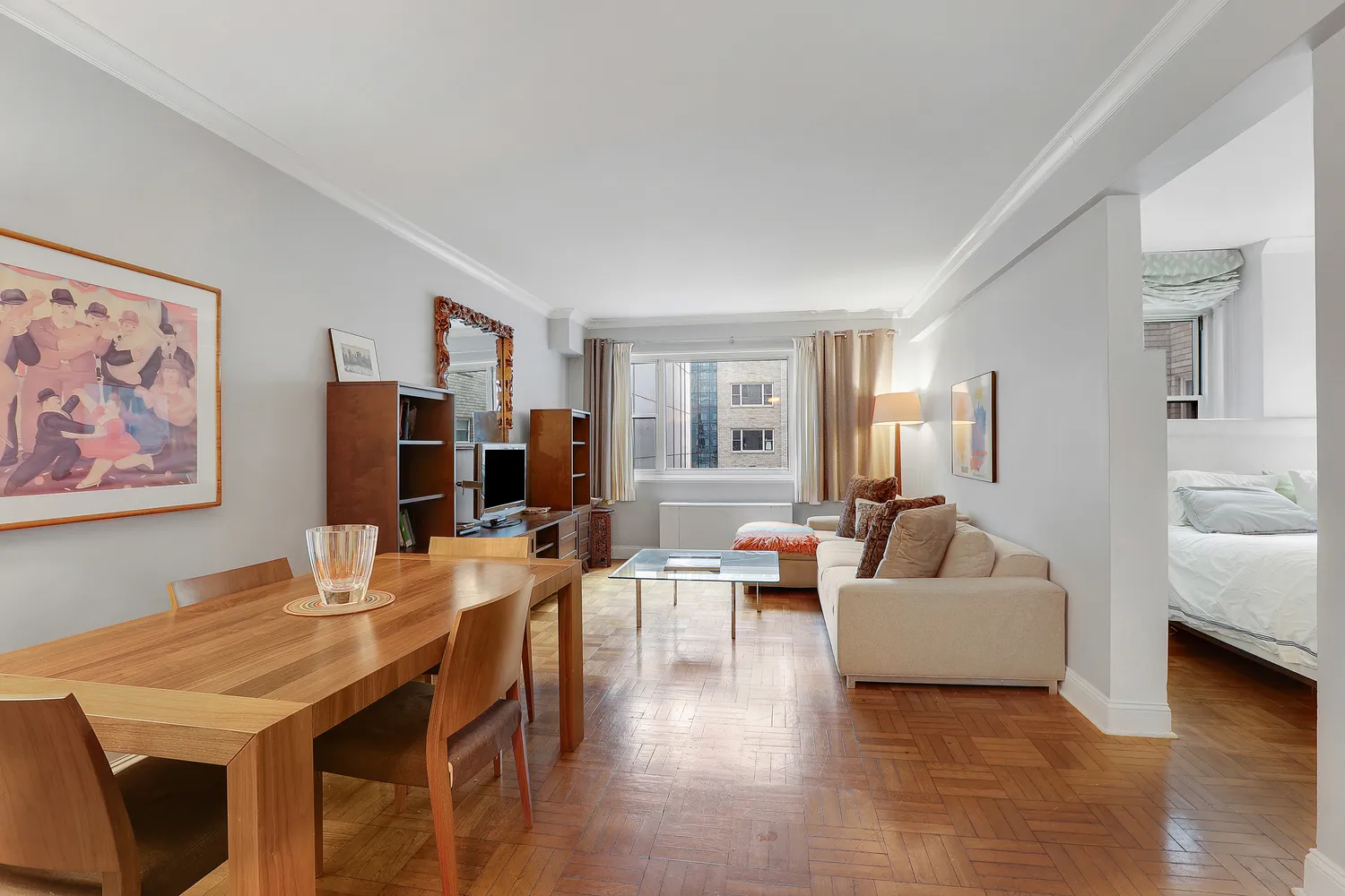 a living room with furniture and a table
