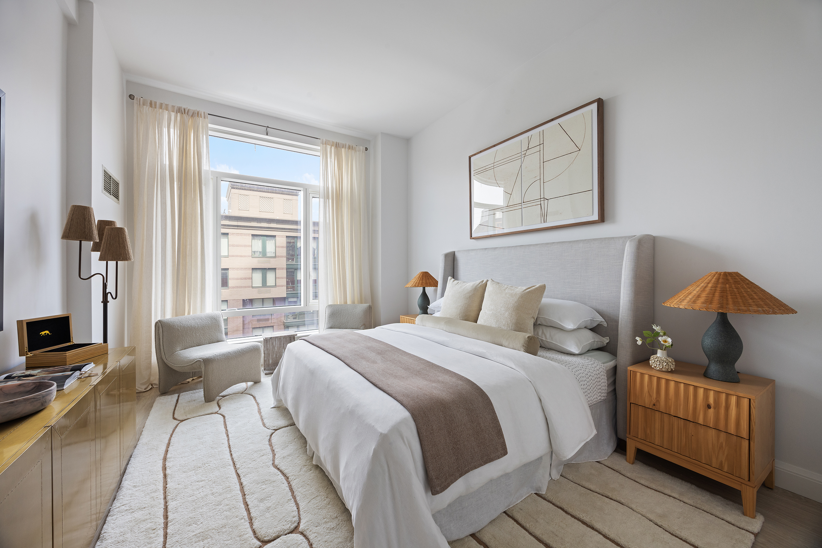 70 Little West Street, Unit 7L Manhattan, NY 10004 - Photo 14 of 25 a bedroom with a bed and wooden floor