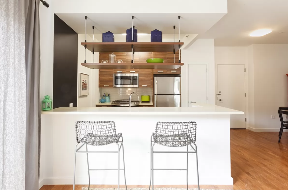 22 Caton Place, Unit 4H Brooklyn, NY 11218 - Photo 2 of 20 a kitchen with stainless steel appliances granite countertop a refrigerator and a stove top oven