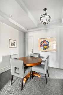 a view of a workspace with furniture