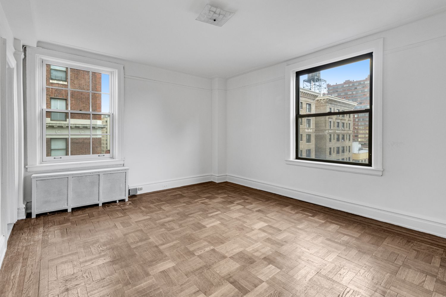 473 West End Avenue, Unit 12A Manhattan, NY 10024 - Photo 12 of 21 an empty room with windows