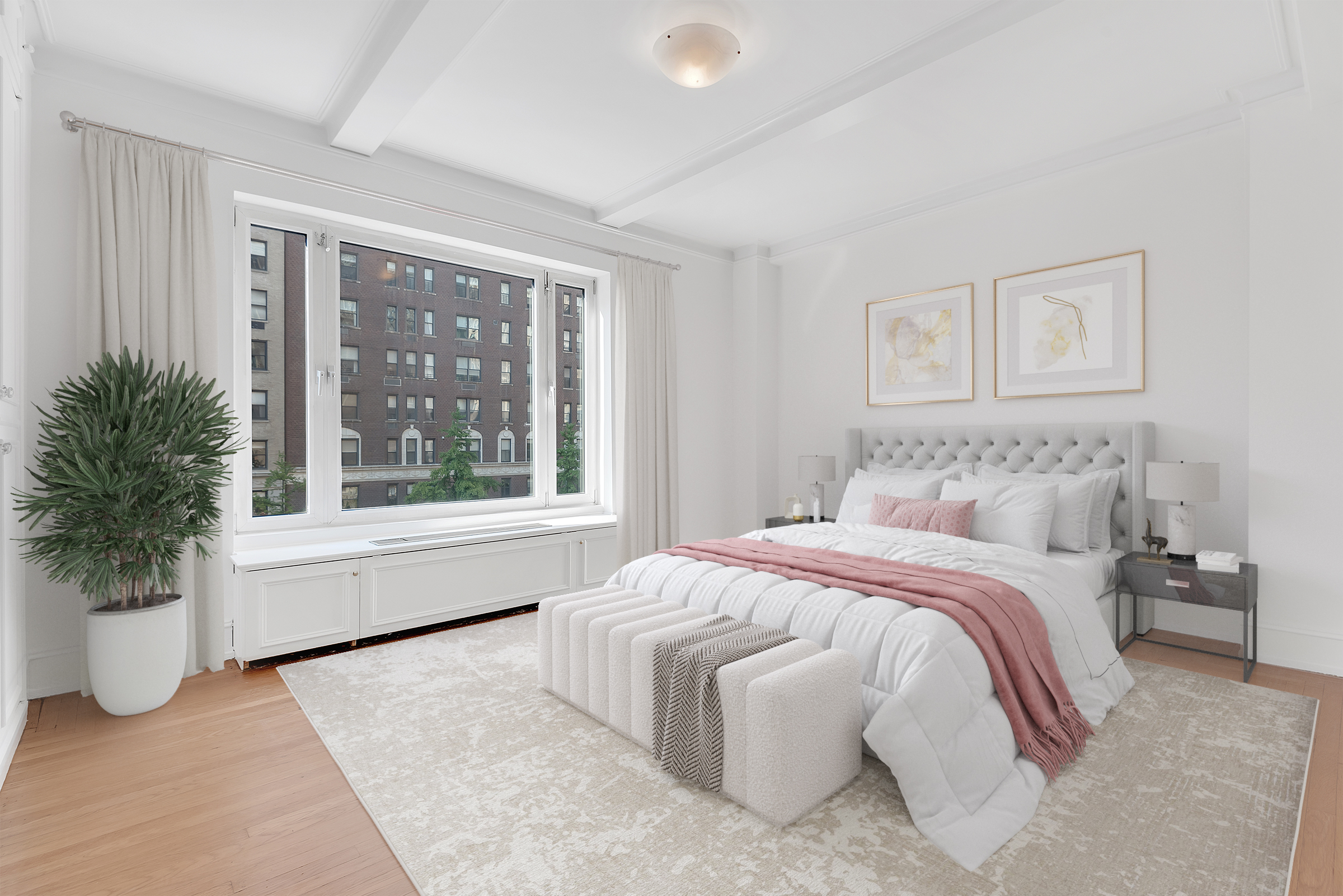 1045 Park Avenue, Unit 5A Manhattan, NY 10028 - Photo 2 of 10 a spacious bedroom with a large bed and a large window