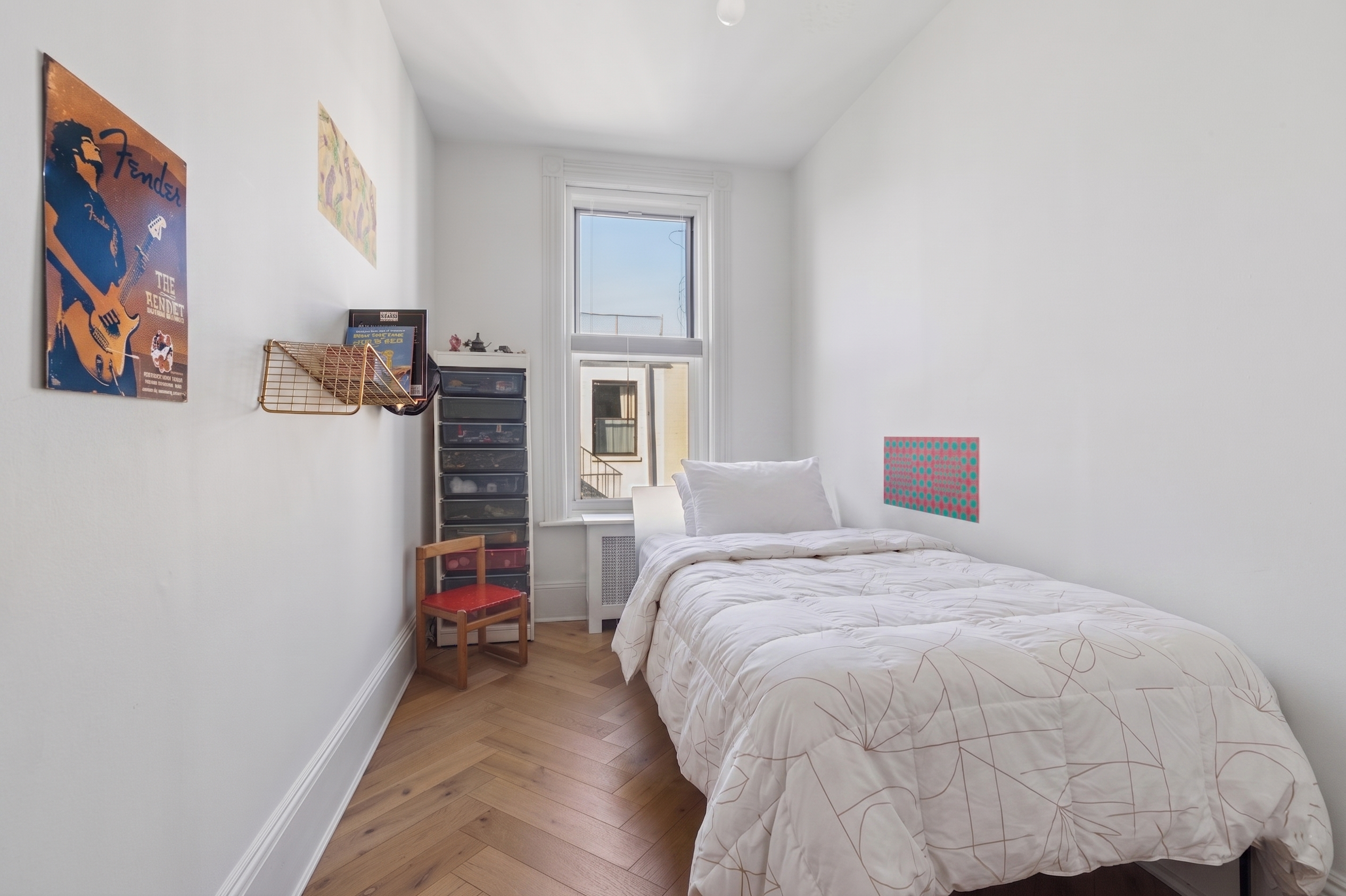 409 3rd Street, Unit 4 Brooklyn, NY 11215 - Photo 5 of 12 a bed room with a bed and a desk