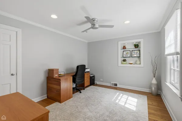 a workspace with furniture and window