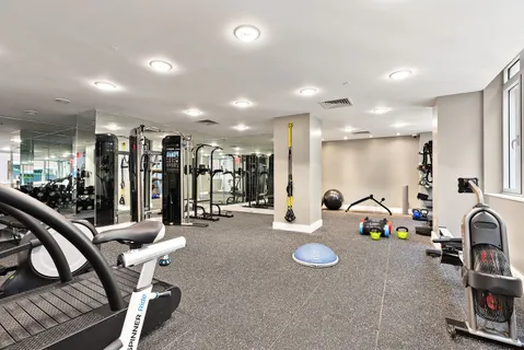 a picture of a bench in a white building