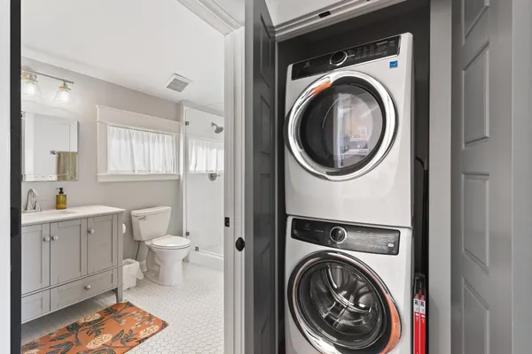 a view of a bathroom with a washer and dryer