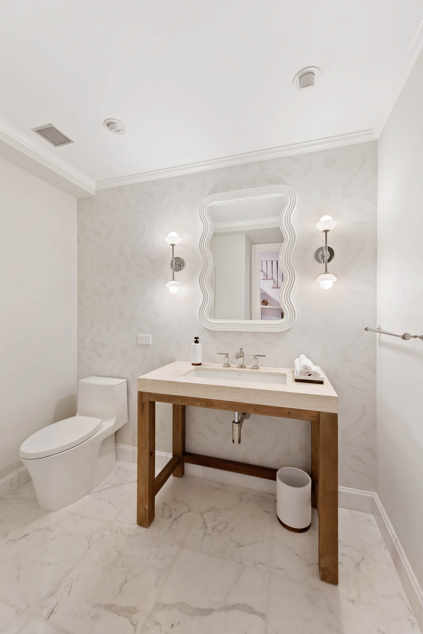 9 West 84th Street Manhattan, NY 10024 - Photo 15 of 31 a view of a bathroom with a sink and mirror