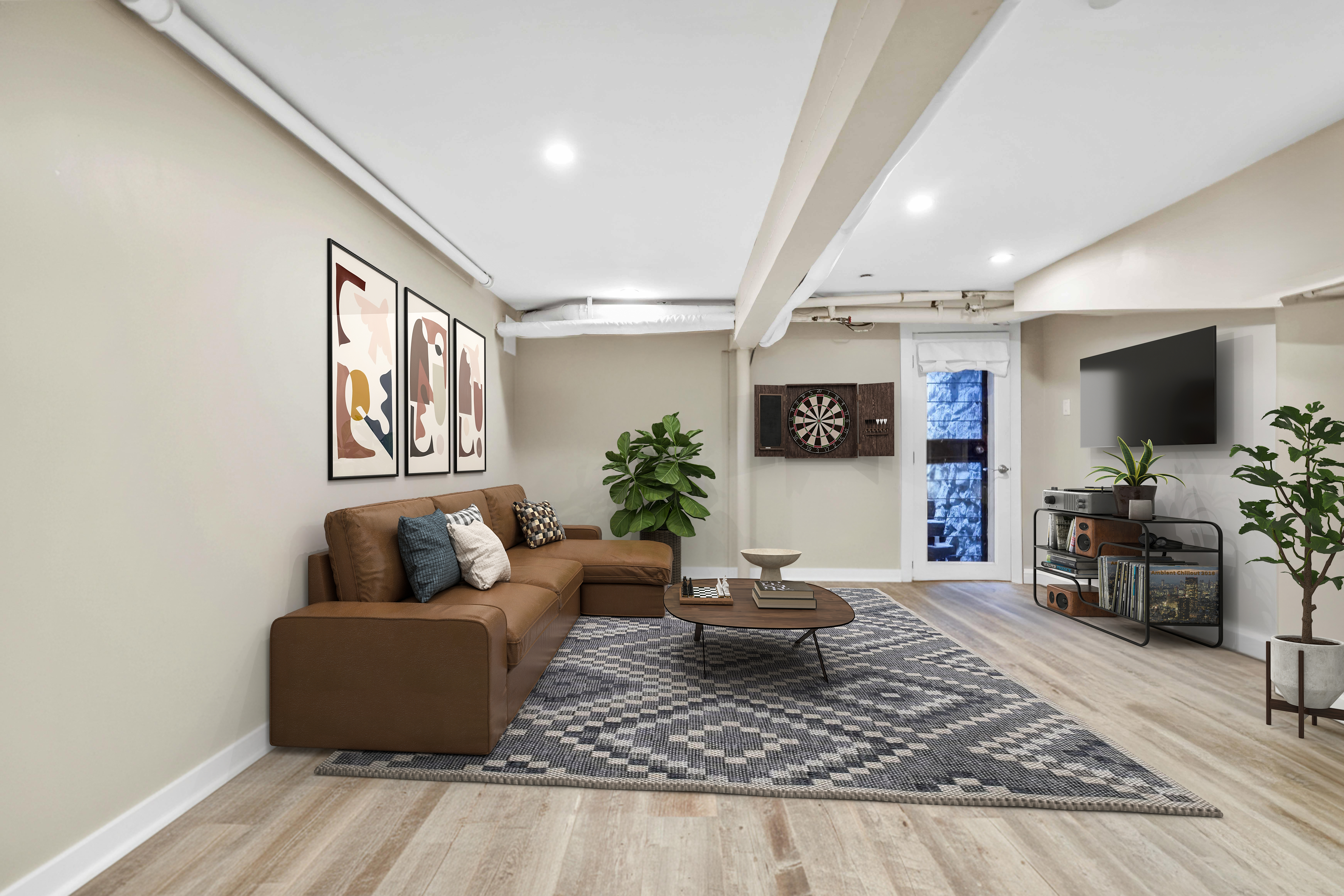 288 St James Place, Unit TRIPLEX Brooklyn, NY 11238 - Photo 21 of 25 a living room with furniture and a flat screen tv