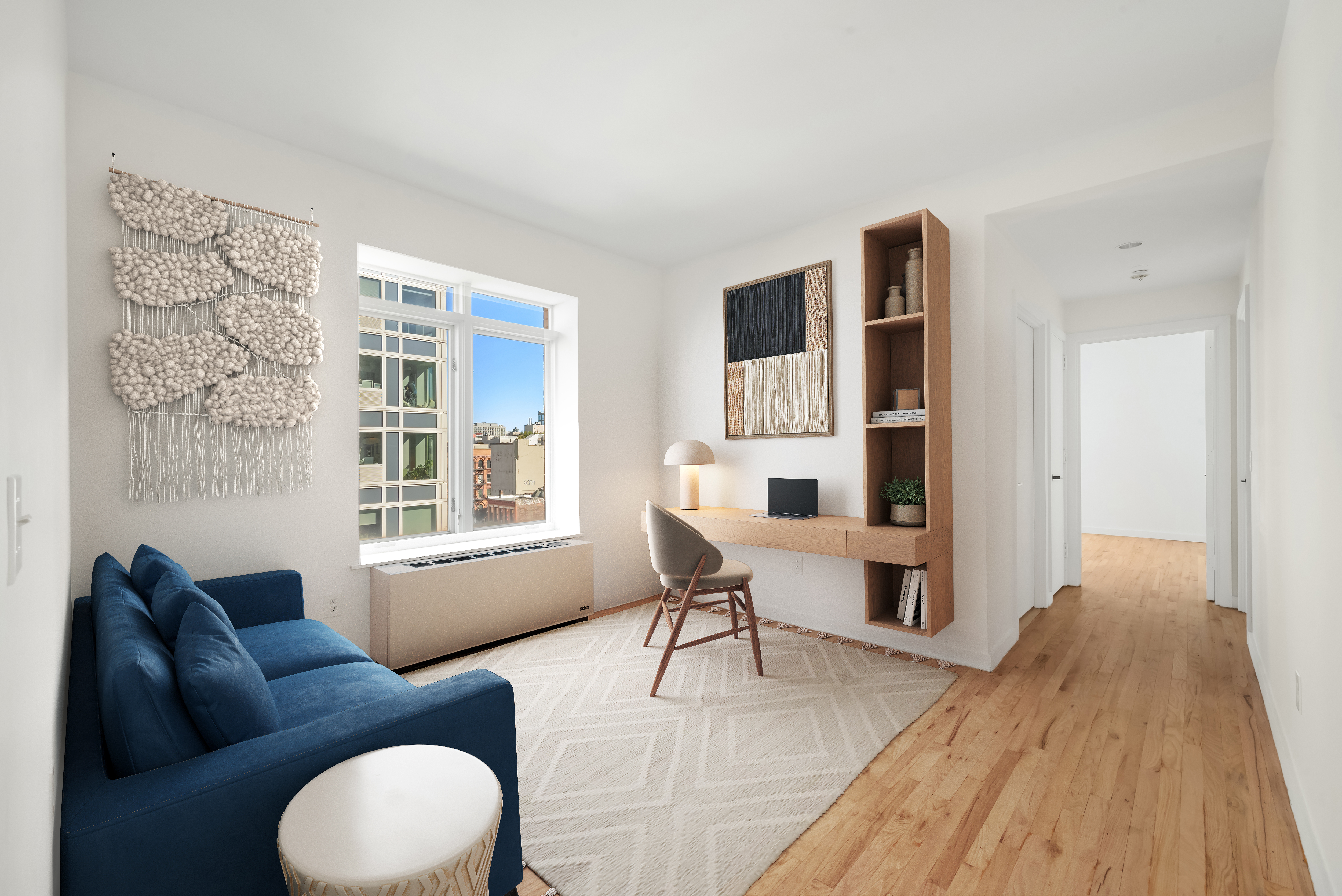 304 West 115th Street, Unit 6A Manhattan, NY 10026 - Photo 3 of 14 a living room with furniture and a window