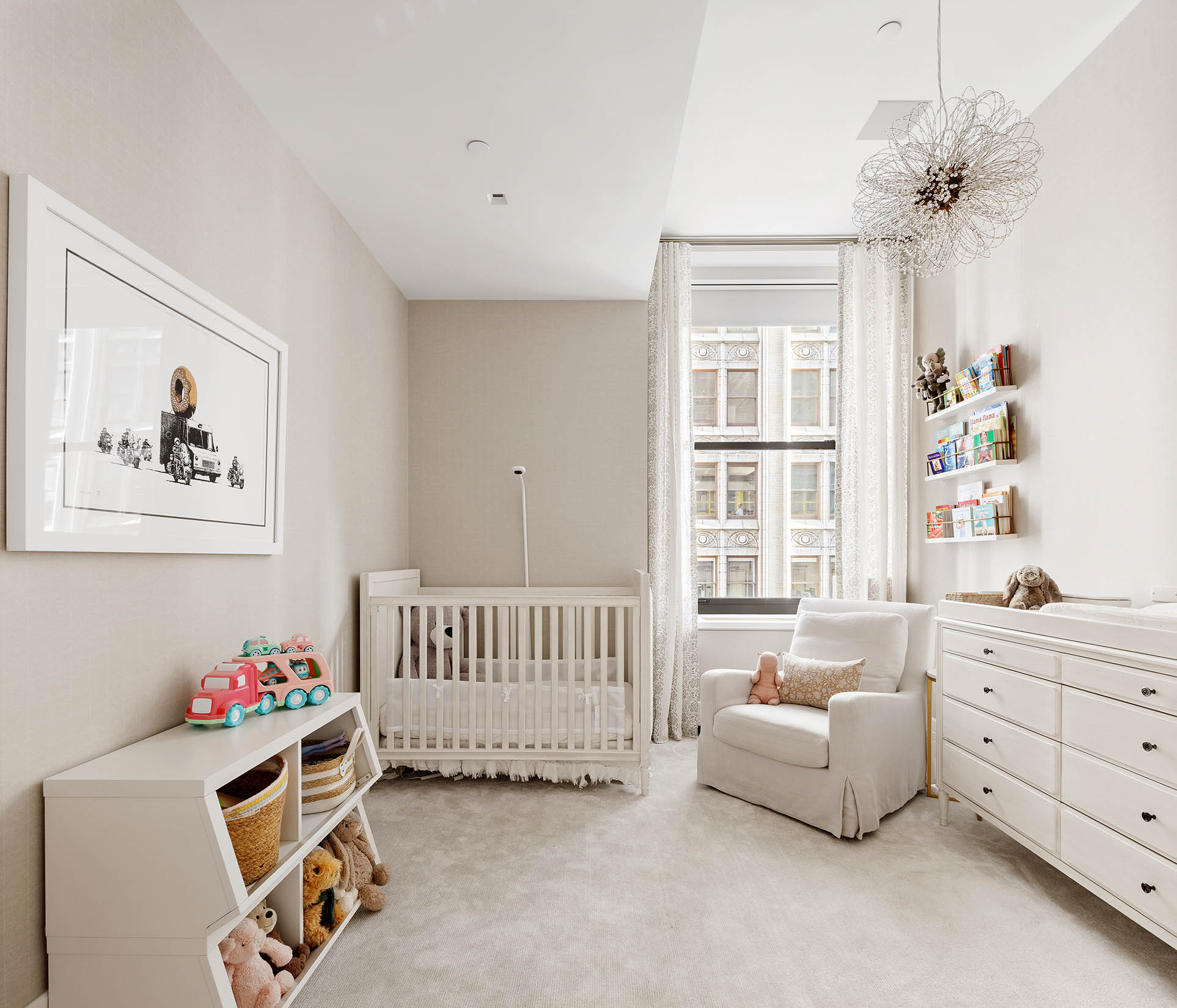 212 5th Avenue, Unit 9B Manhattan, NY 10010 - Photo 11 of 16 a bedroom with furniture and a window