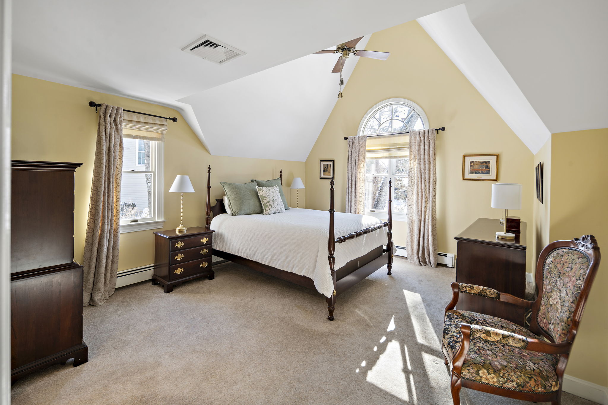 56 Jefferson Road Winchester, MA 01890 - Photo 17 of 26 a bedroom with a bed couch and a window