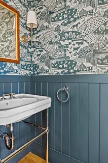 a view of a dining room a table and chairs