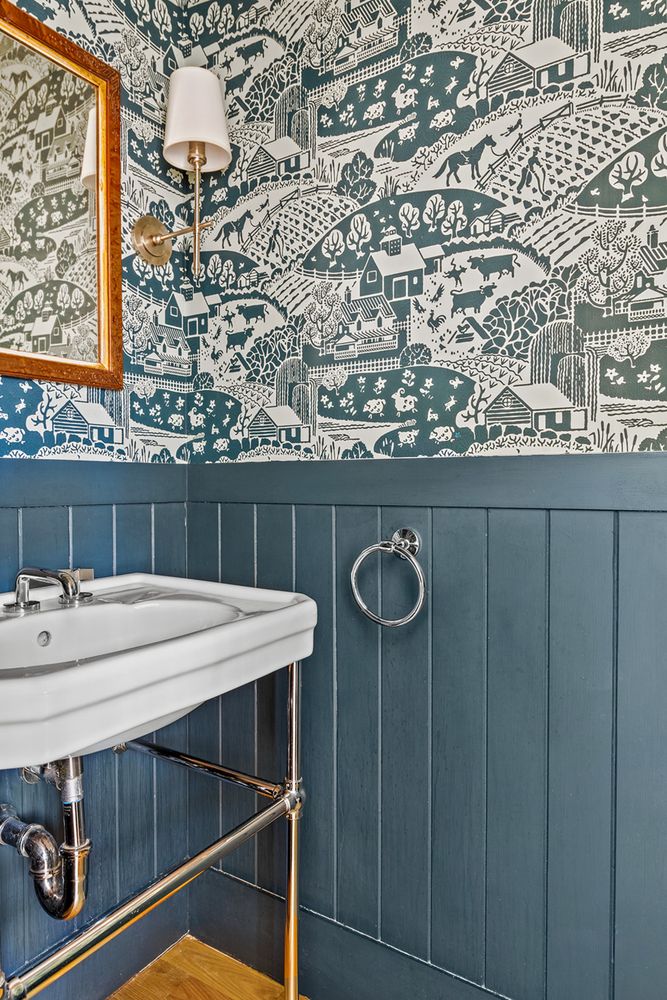 a view of a dining room a table and chairs