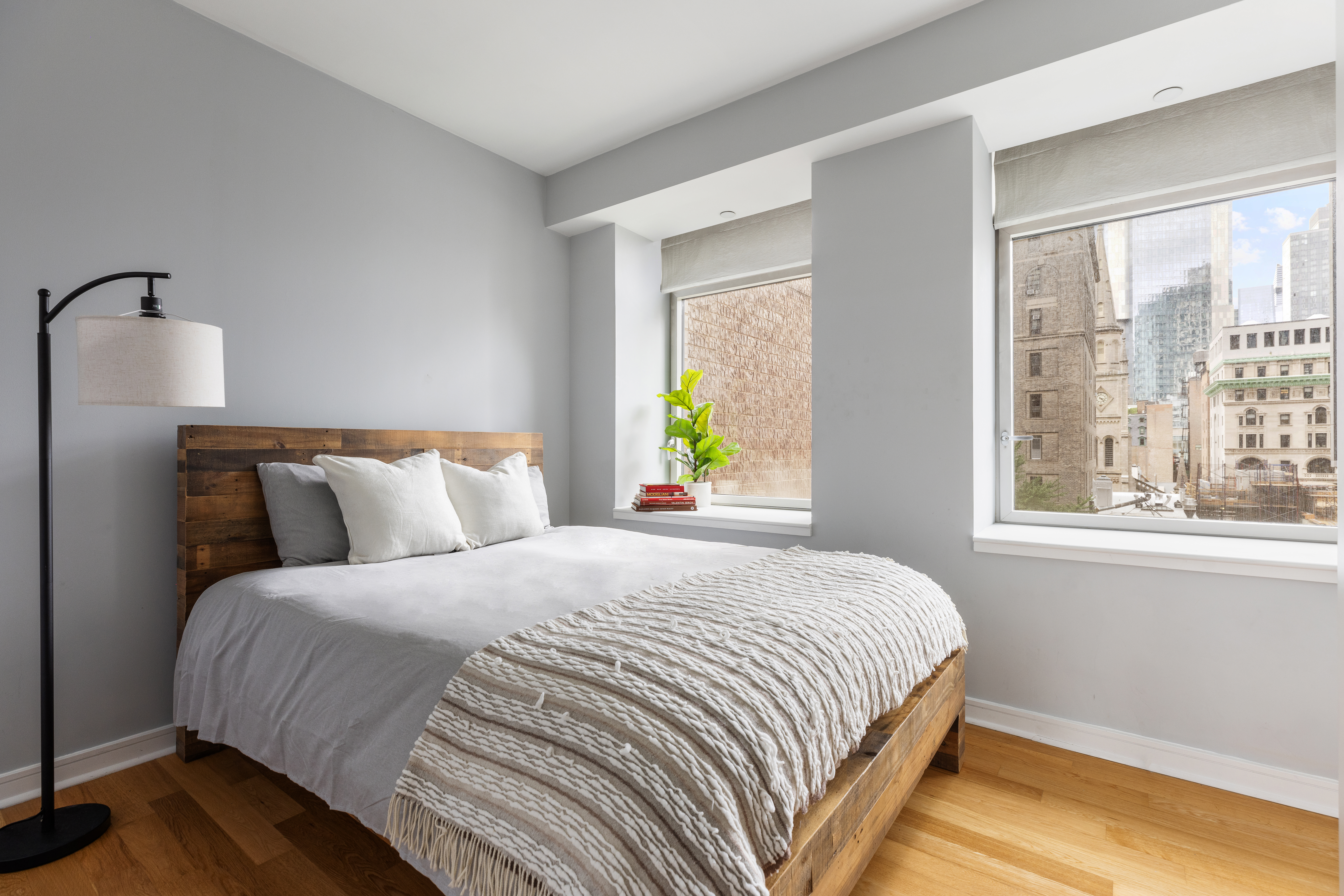 11 East 29th Street, Unit 7B Manhattan, NY 10016 - Photo 4 of 6 a bedroom with a bed and a window