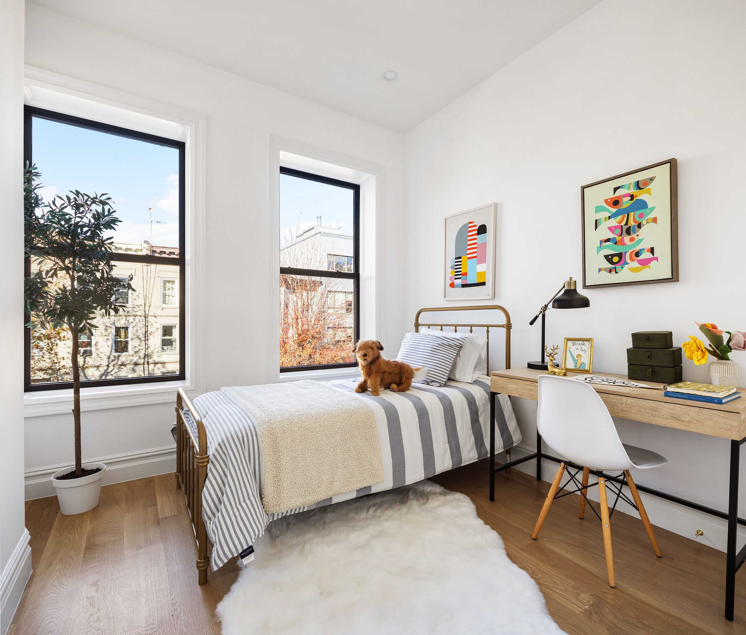 716 Decatur Street Brooklyn, NY 11233 - Photo 11 of 17 a bedroom with a bed and a desk