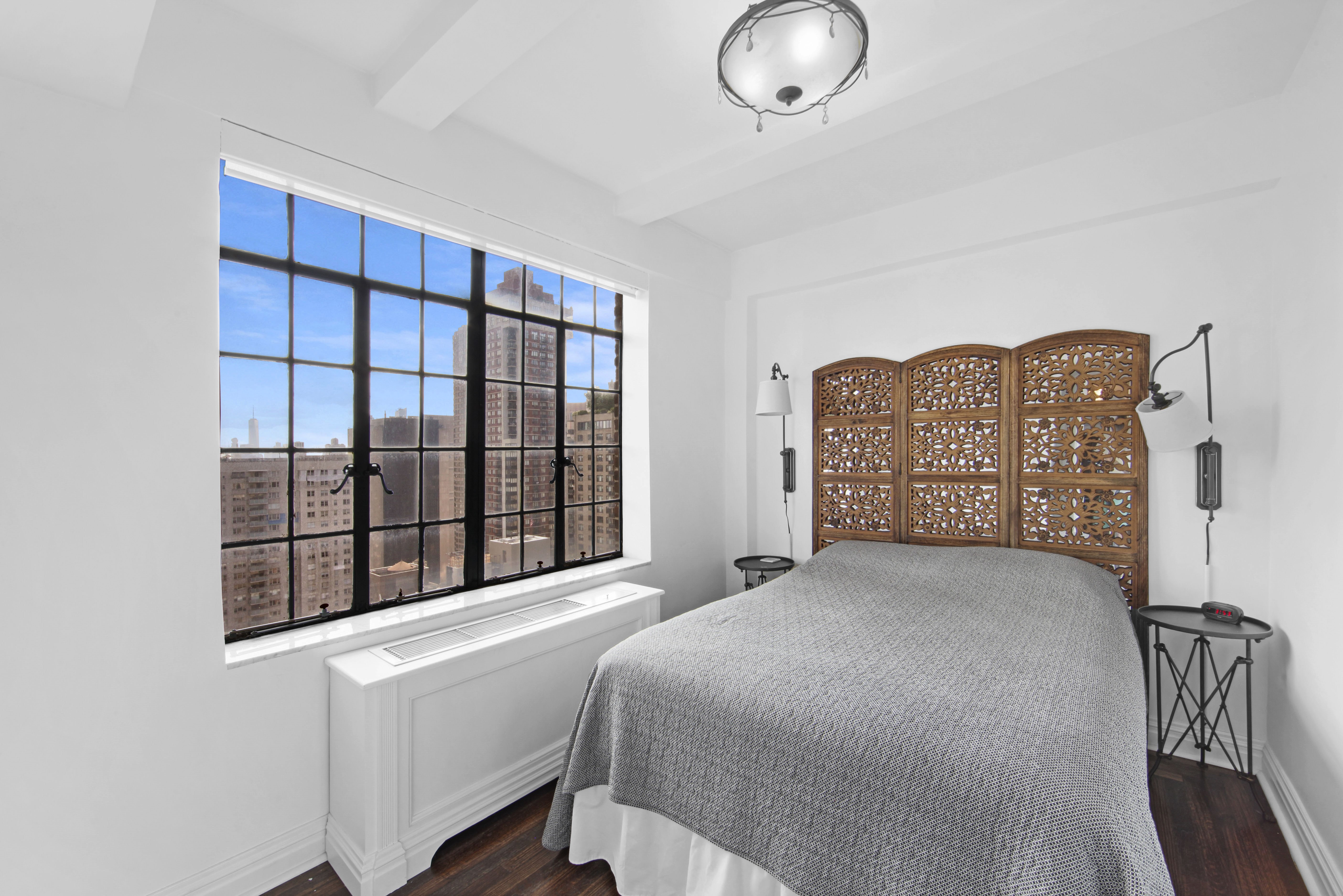 320 East 42nd Street, Unit 3012 Manhattan, NY 10017 - Photo 9 of 12 a view of a big room with windows