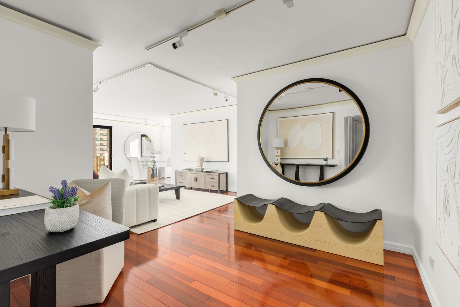 a living room with furniture and a table