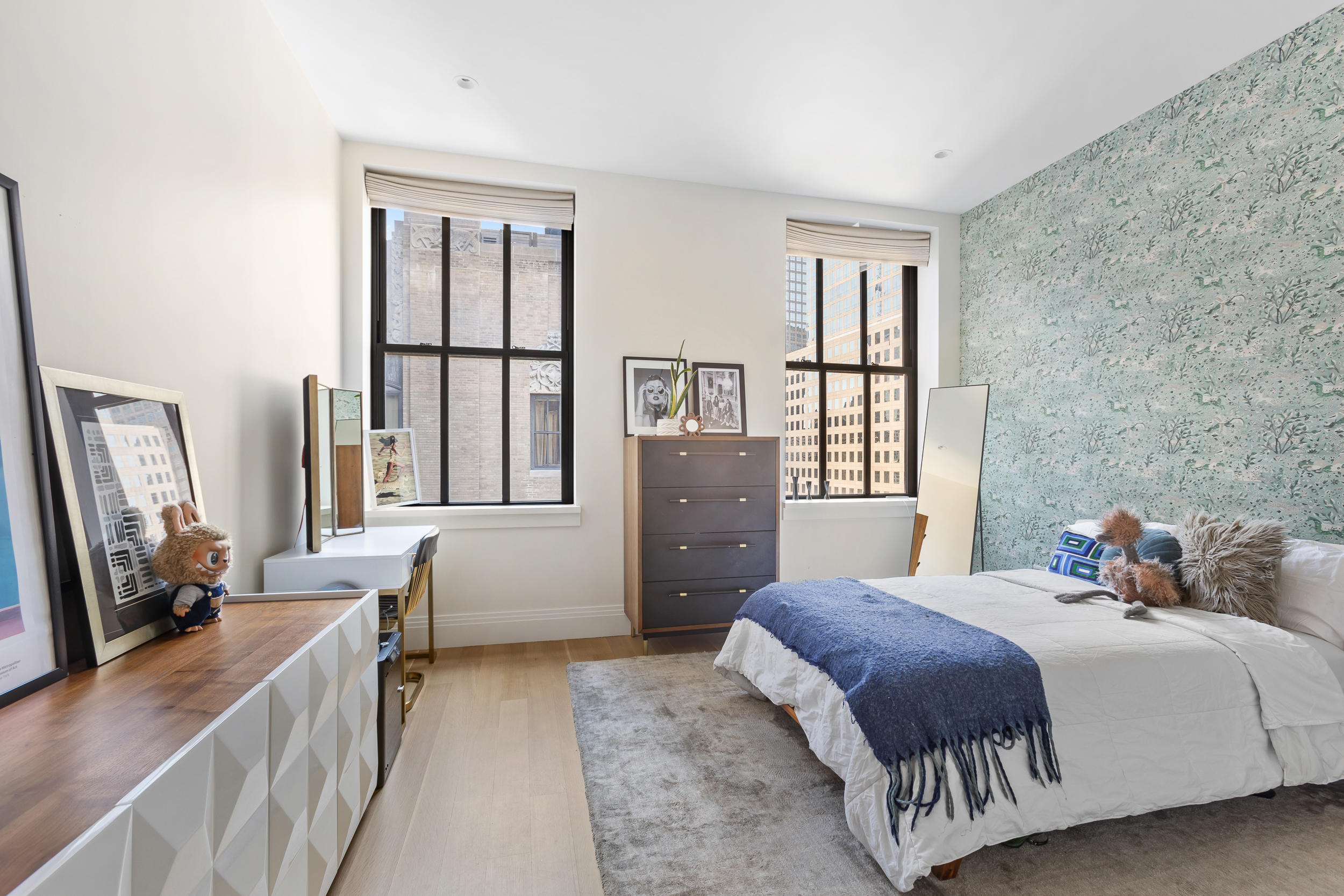 100 Barclay Street, Unit 17A Manhattan, NY 10007 - Photo 9 of 24 a bedroom with a large bed and a window