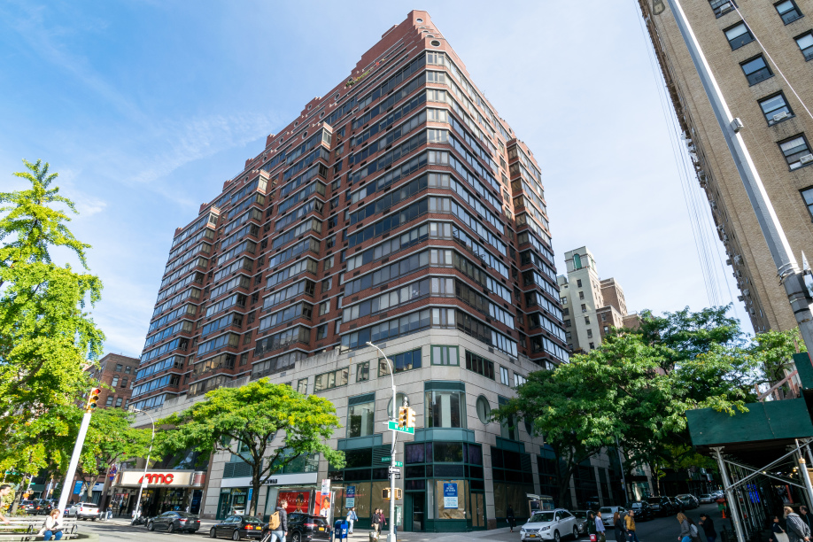 225 West 83rd Street, Unit 10K Manhattan, NY 10024 - Photo 19 of 21 a view of a building with a tree